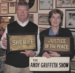 Neil & Pat Coleman holding the courthouse door plaques.